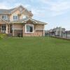 Emerald Green 110oz artificial turf room scene
